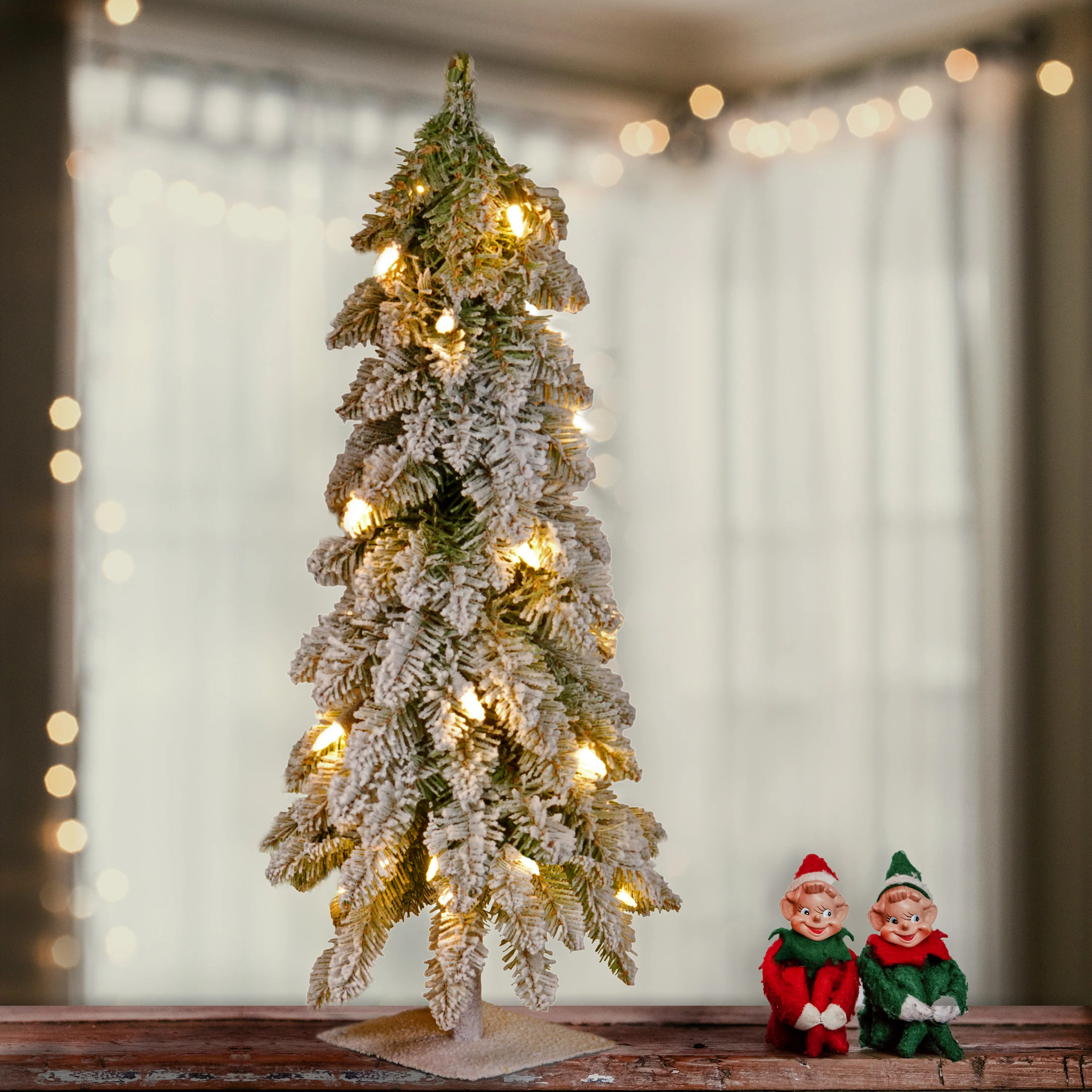 2 ft. Pre-Lit Snowy Downswept Forest Tree with Clear Lights, Plug-In - Image 12