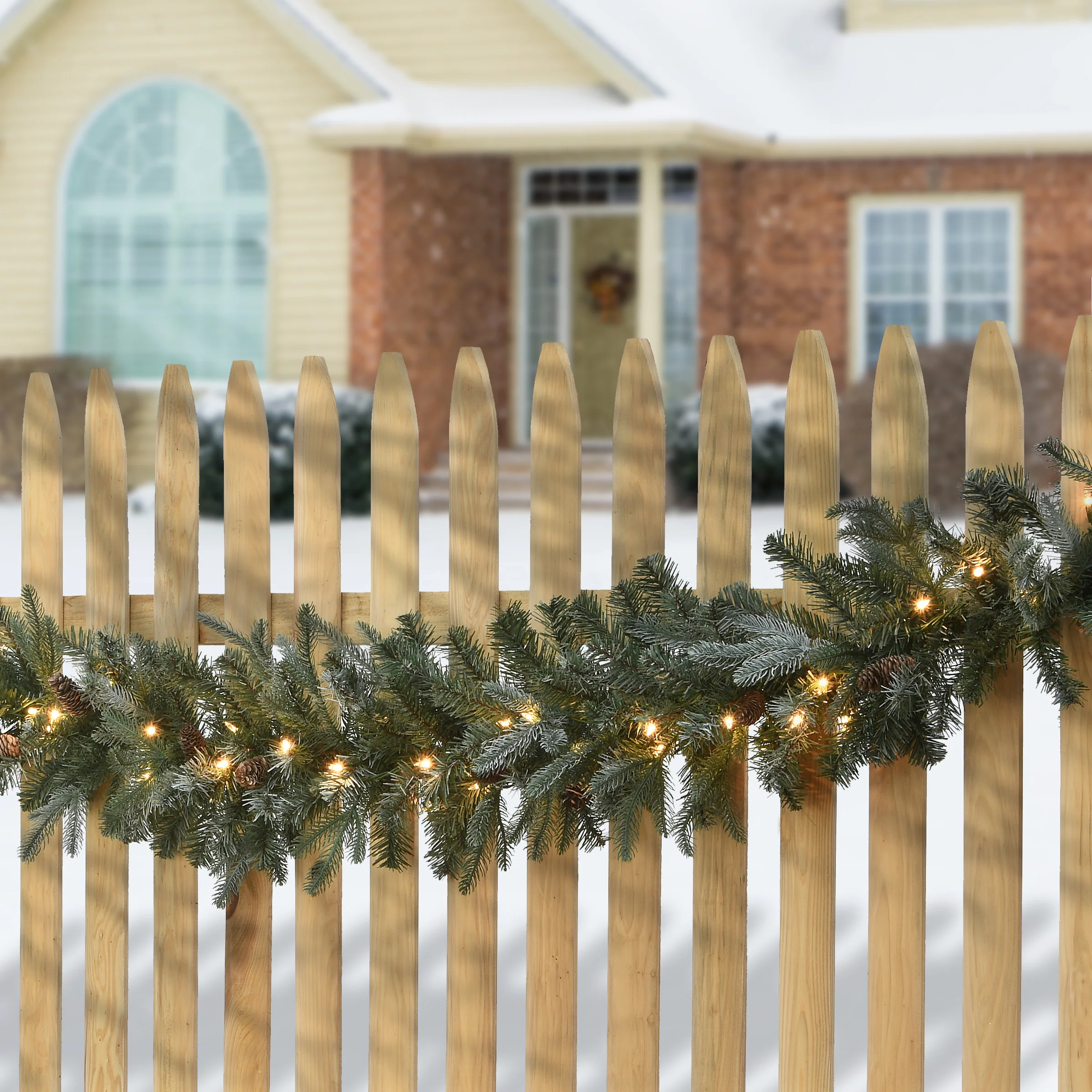 9 ft. Pre-Lit Frosted Arctic Spruce Garland with Clear Lights, Plug-In - Image 6